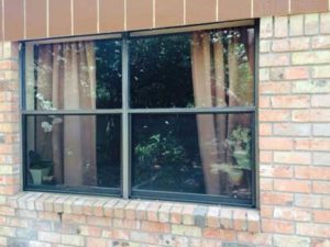 two old single hung windows non-compliant egress
