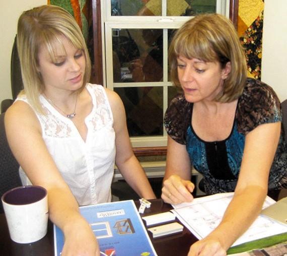 Ringer Windows representative Georgia Torok works with a client