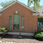 Clay center single hung with side flanking picture windows